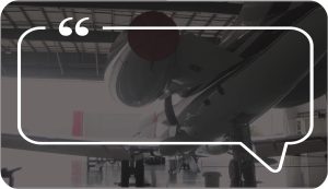 airplane with exhaust cover in hanger