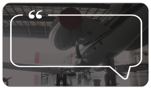 airplane with exhaust cover in hanger